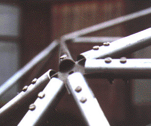[6 tubes bolted onto 6-way joint]