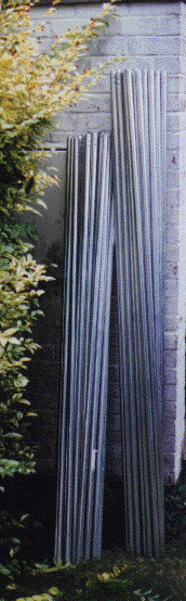 [two stacks of aluminium tubes]